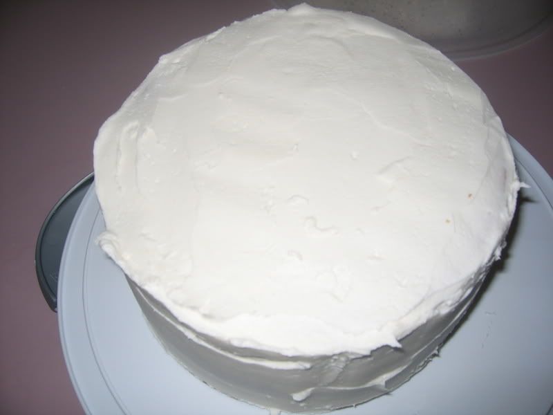 This is a picture of the cake before I smoothed it using the foam roller.