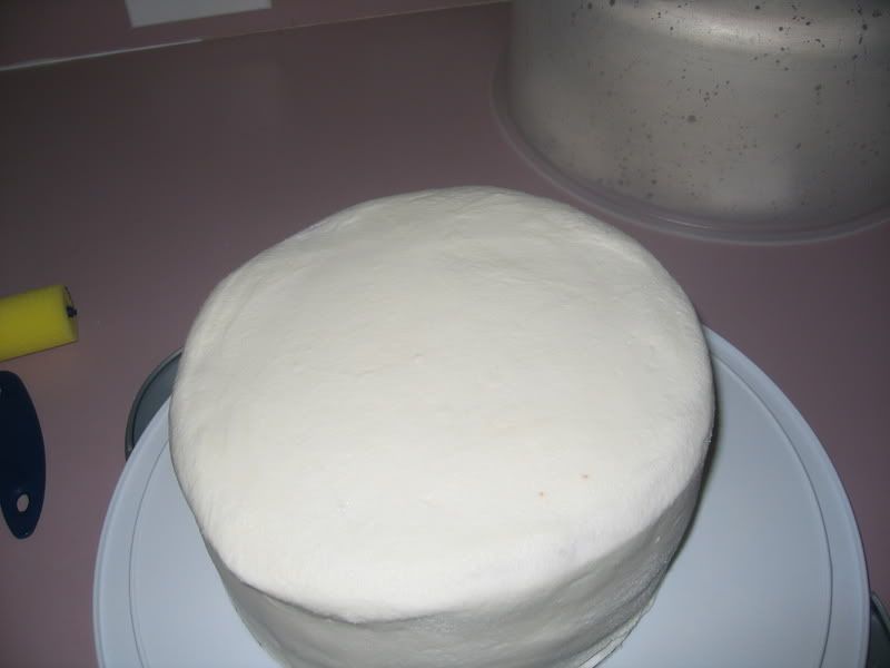 The cake after it was smoothed using the foam roller
