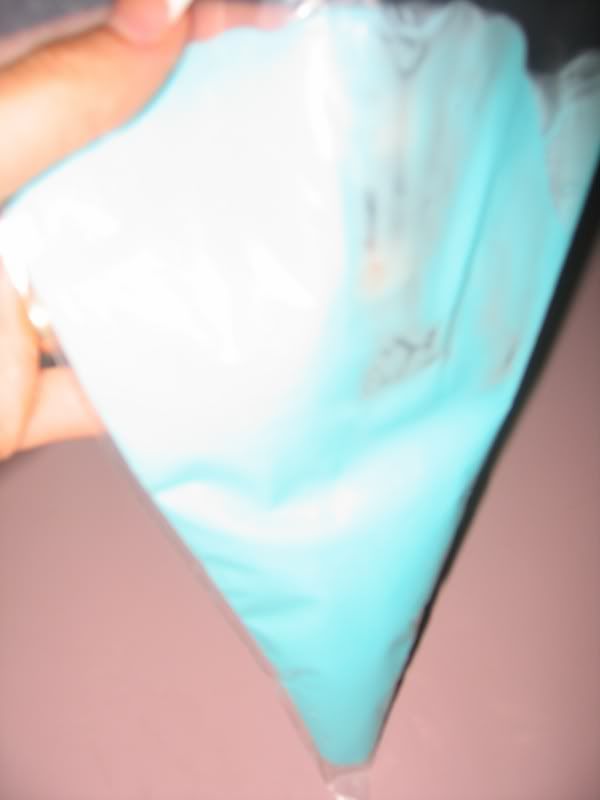 Push the melted candy down to the bottom of the bag. 