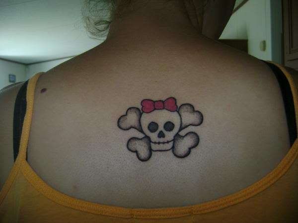 pink bow tattoos. Skull And Crossbones Tattoo