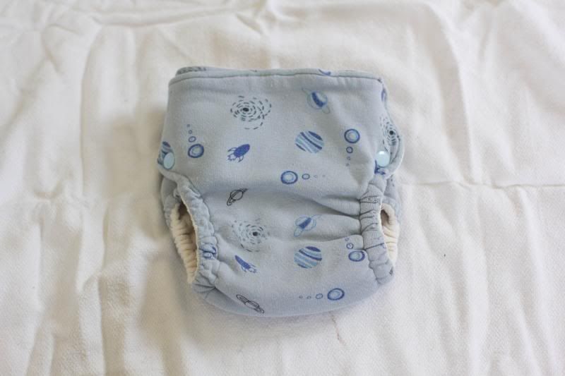 Cloth Indulgence size medium/large, space print fitted, PPD to US Cloth Indulgence size medium/large, space print fitted, PPD to US