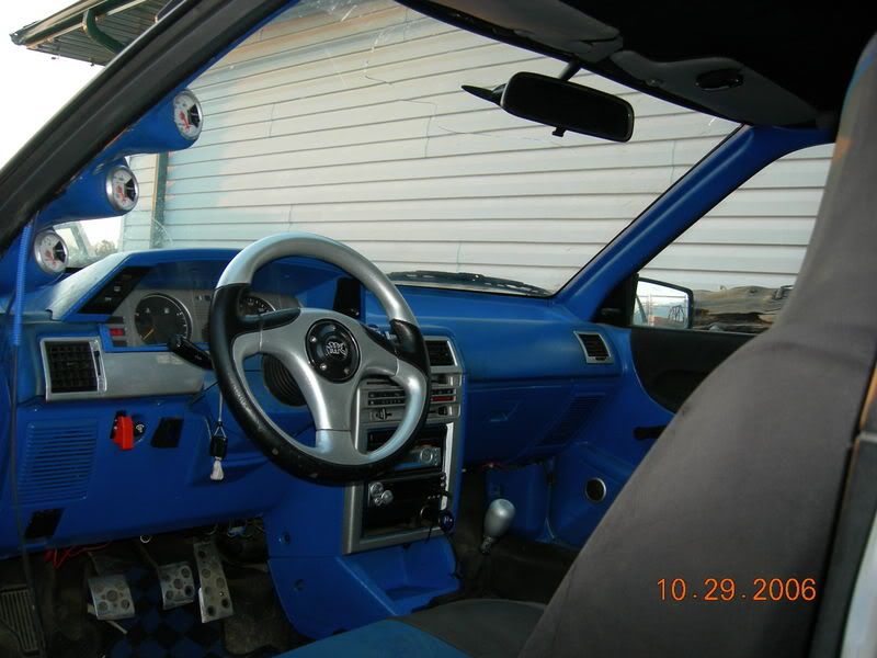 http://i85.photobucket.com/albums/k77/blueviper91/mycars004.jpg